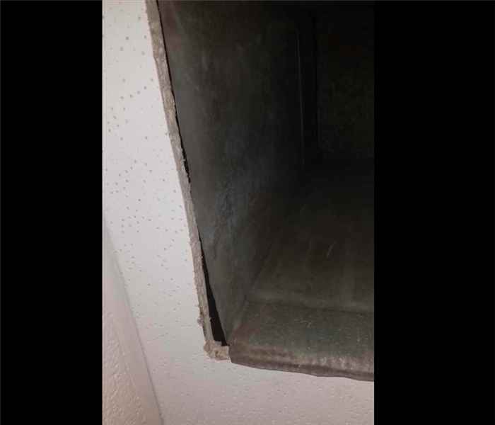 Cleaned HVAC duct with clean metal vents 