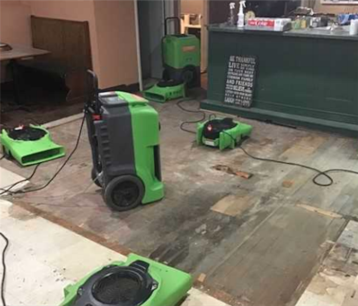 Green Servpro equipment in commercial building 
