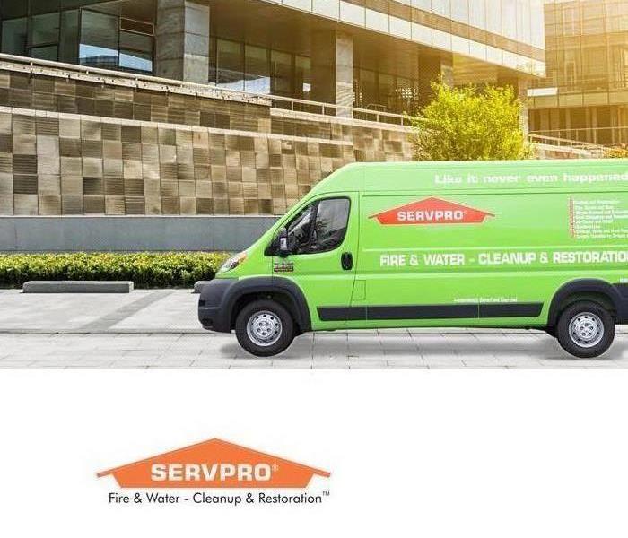 Servpro truck in front of a commercial building 
