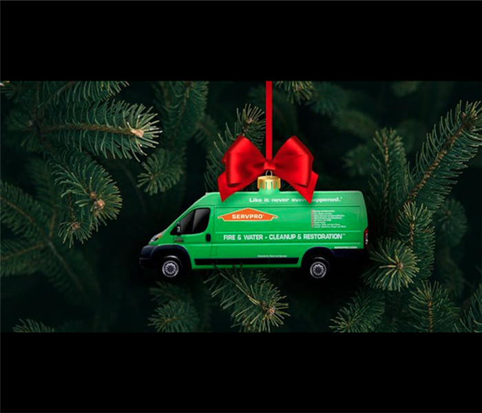 SERVPRO green truck ornament hanging on Christmas Tree