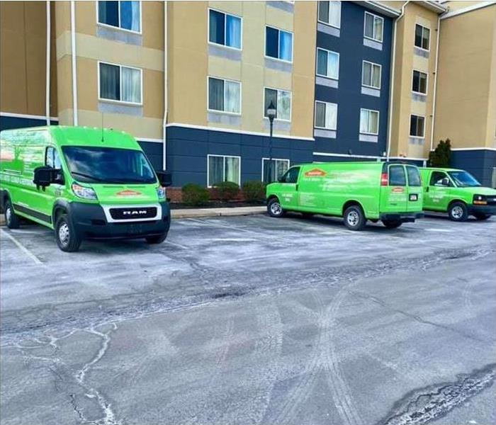 SERVPRO trucks in front of hotel